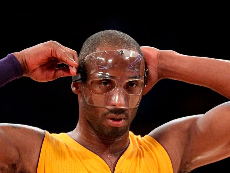 Basketball player wearing a protective face mask