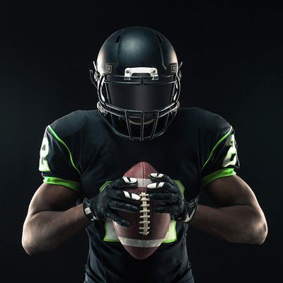 Football player wearing an Under Armour visor during a game