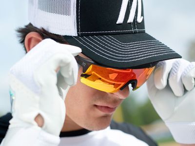 Baseball player wearing Marucci Shield sunglasses on the field